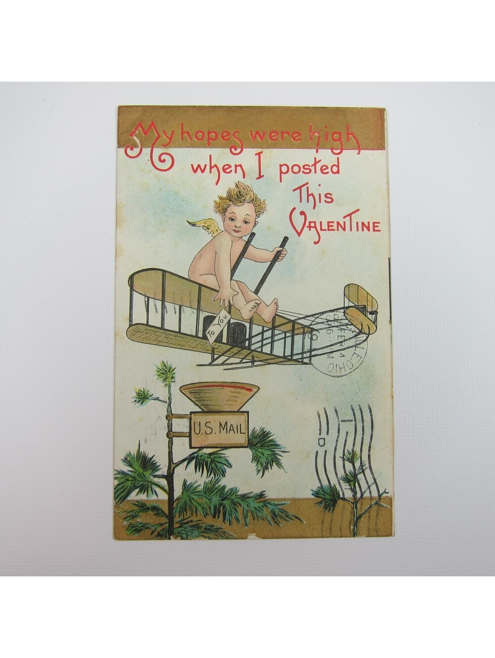 Postcard Valentine Cupid Rides Biplane Airplane Over Mailbox Tree Antique 1911